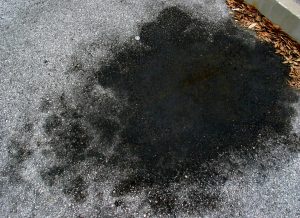 remove oil stain in driveway